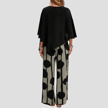 Duna | Modieuze damesoutfit met asymmetrische top en geprinte broek