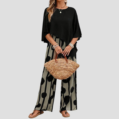 Duna | Modieuze damesoutfit met asymmetrische top en geprinte broek