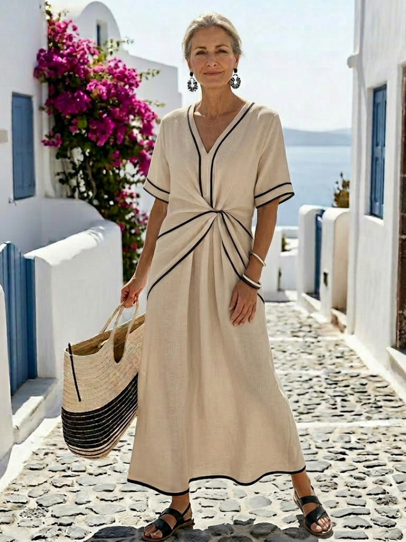 Linnea | Midi-jurk met V-hals, korte mouwen en geplooide taille