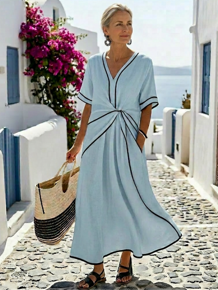 Linnea | Midi-jurk met V-hals, korte mouwen en geplooide taille